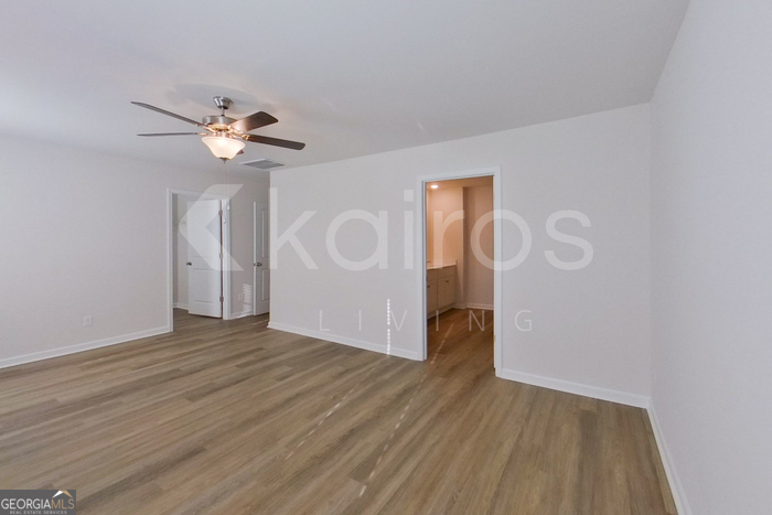 109 Inez Avenue Springfield, GA 31329 - Photo 12 of 26 a view of empty room with wooden floor
