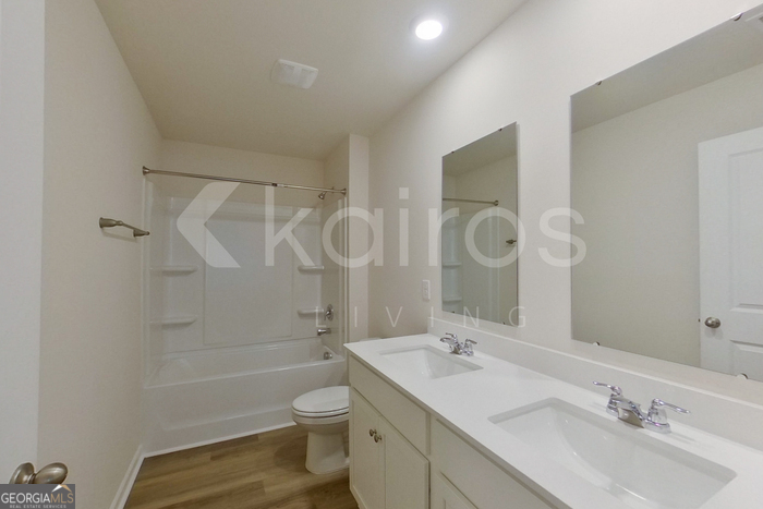 109 Inez Avenue Springfield, GA 31329 - Photo 14 of 26 a bathroom with a sink a toilet and shower