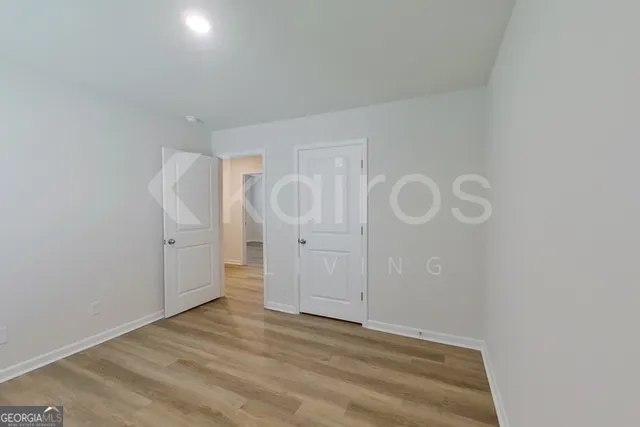 a view of a room with racks on the wall