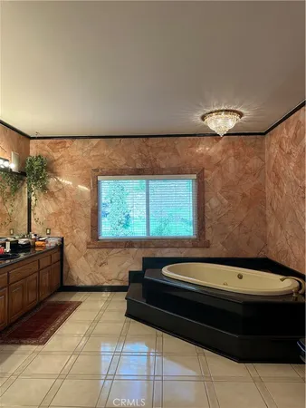 a bathroom with a bathtub and a sink