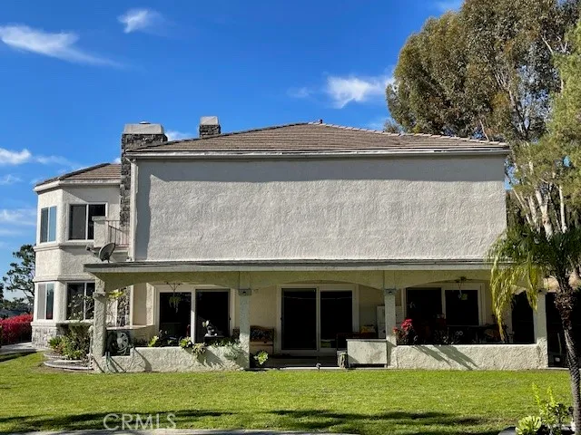 a view of a building with a yard