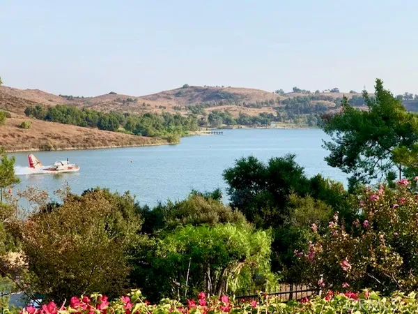 a view of a lake with a mountain in the background