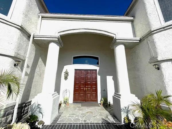 a front view of a house with a garage