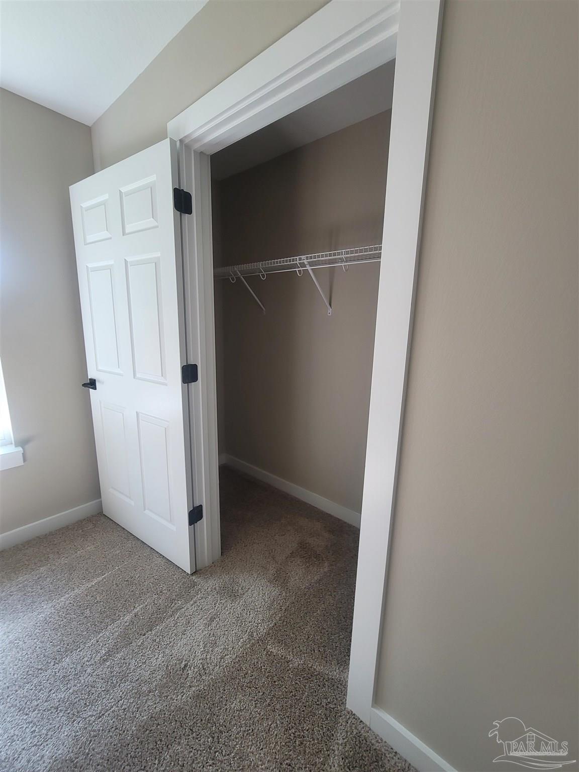 3030 Ferris Drive Navarre, FL 32566 - Photo 28 of 40 an empty room with closet