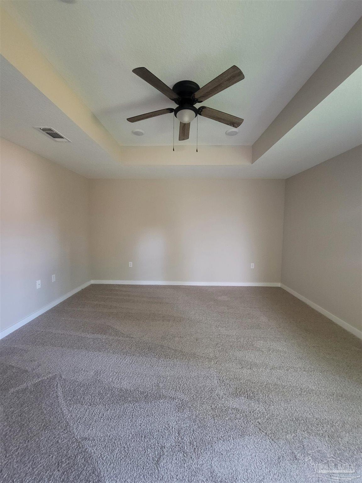 3030 Ferris Drive Navarre, FL 32566 - Photo 38 of 40 a view of a ceiling fan in a room