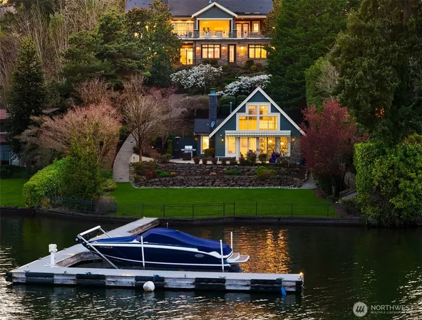 a view of a lake with a house in the background