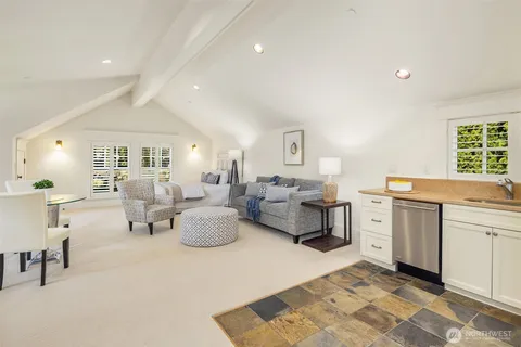 a living room with furniture and view of living room
