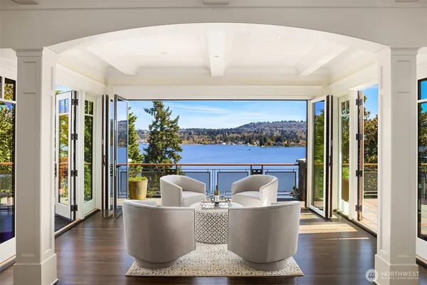 a view of a dining room with furniture and wooden floor
