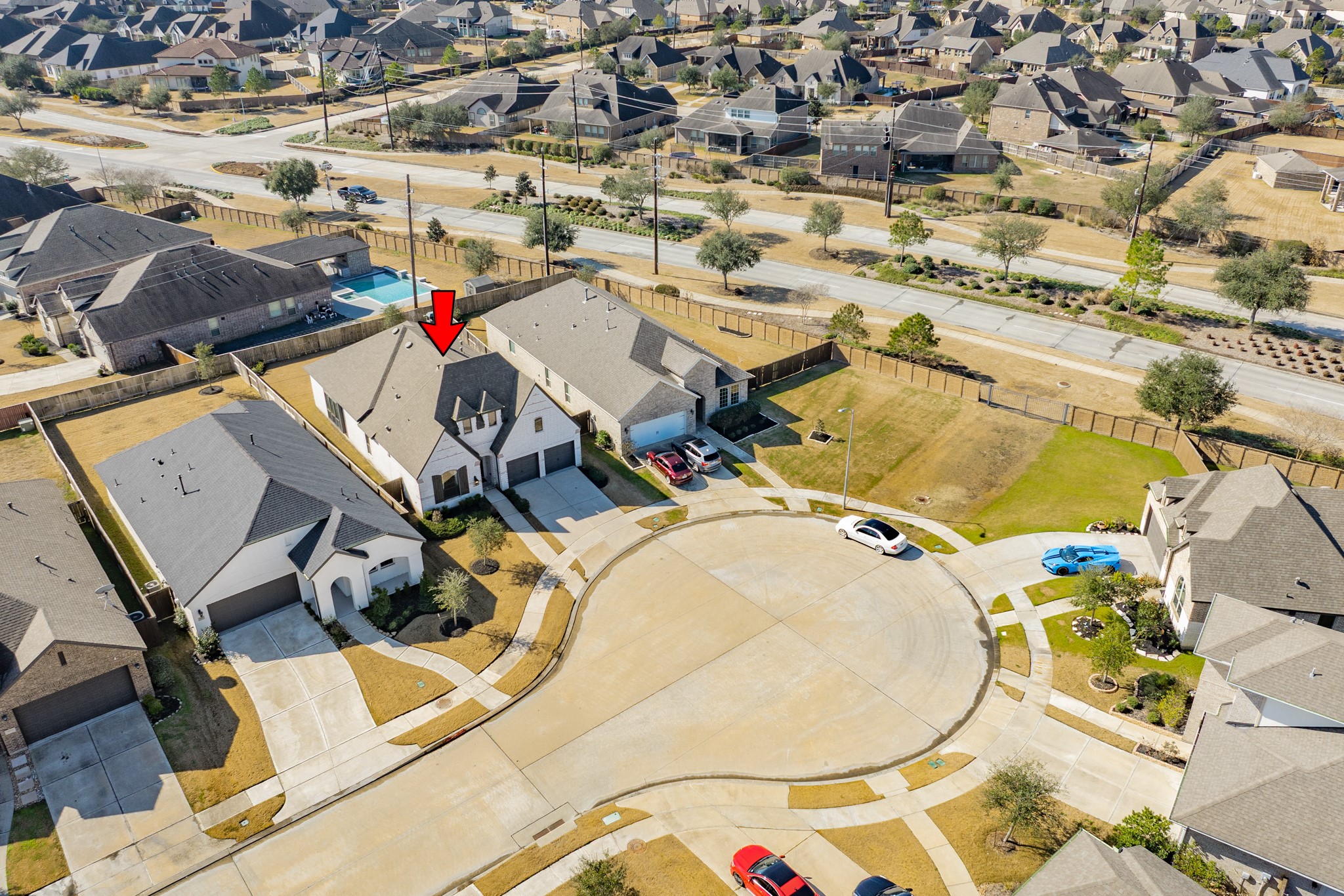 3806 Shackleton Court Rosharon, TX 77583 - Photo 32 of 50 Aerial view of the roof, a 30-year roof, with surrounding neighborhood visible.