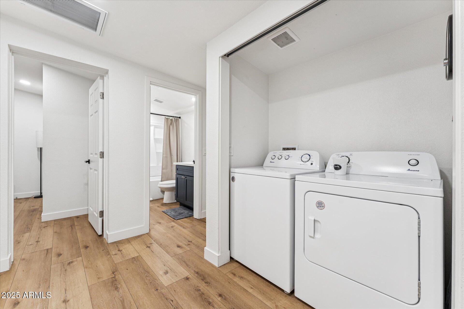 1548 North Upland Circle, Unit B Mesa, AZ 85201 - Photo 16 of 18 a utility room with dryer and washer