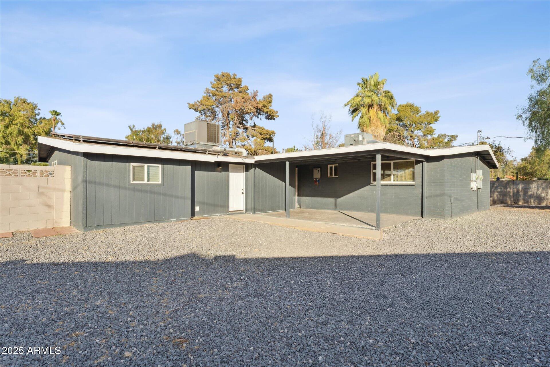 1548 North Upland Circle, Unit B Mesa, AZ 85201 - Photo 17 of 18 a view of a house with a outdoor space