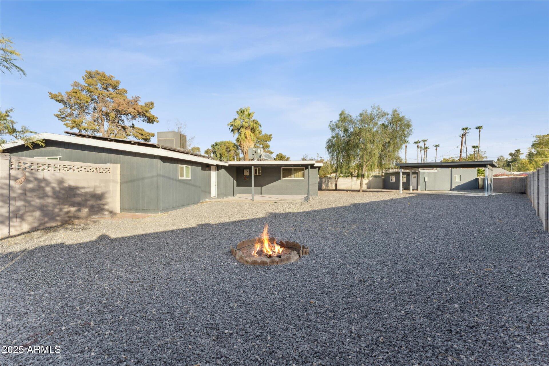 1548 North Upland Circle, Unit B Mesa, AZ 85201 - Photo 18 of 18 a backyard of a house with lots of green space