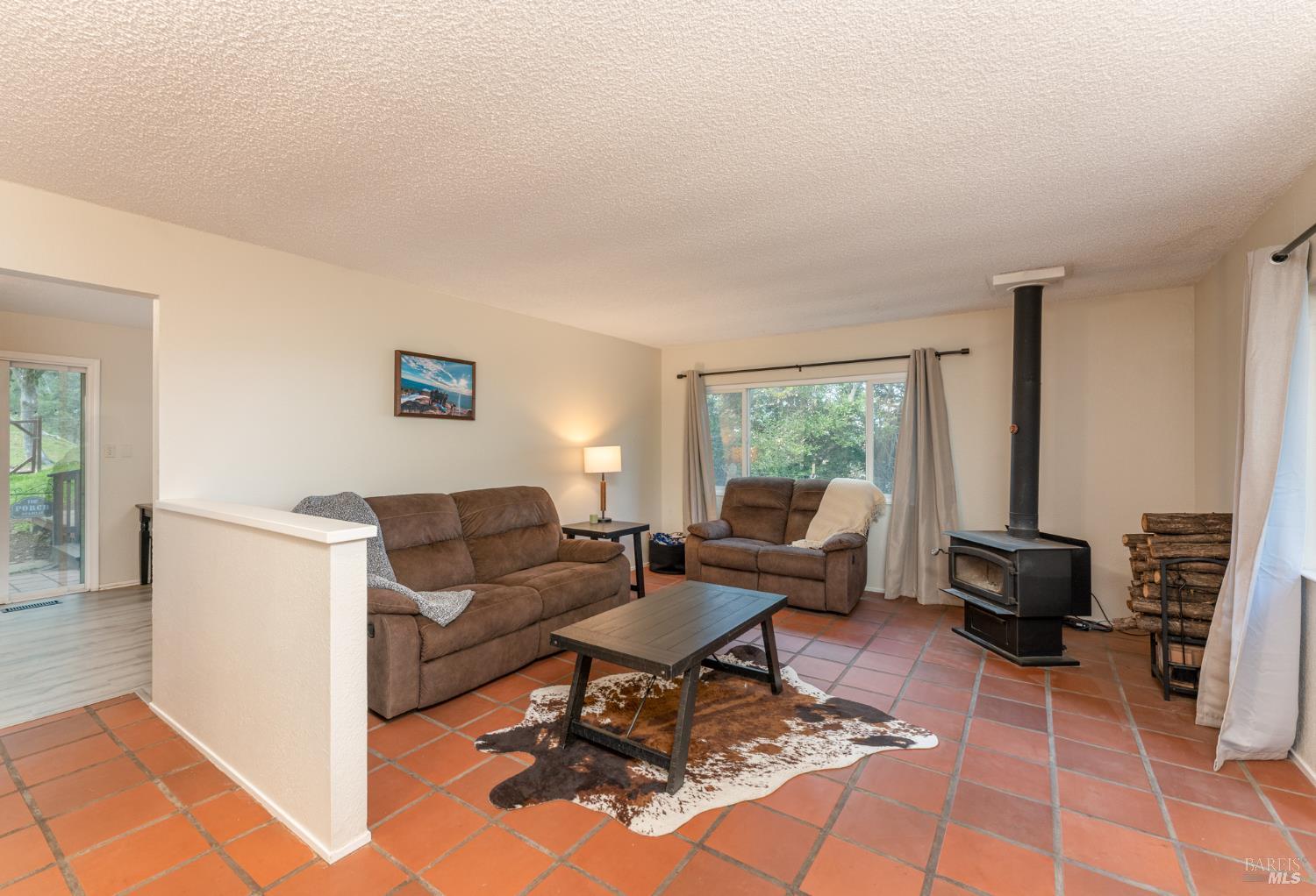 132 Ridgecrest Drive Napa, CA 94558 - Photo 7 of 41 Living room with a woodstove and views