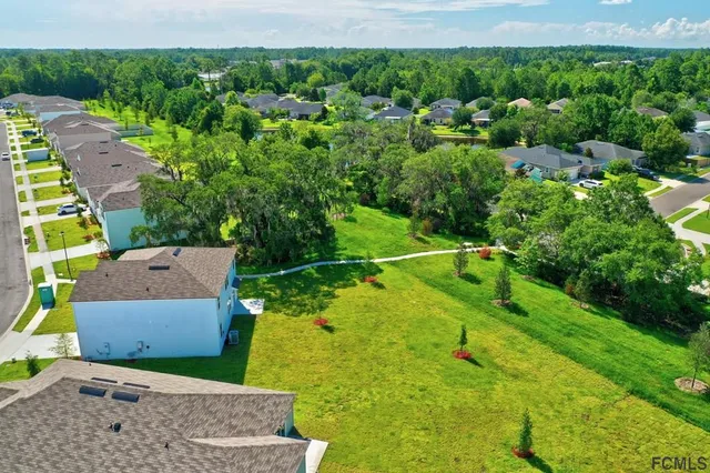 a view of a city with an ocean