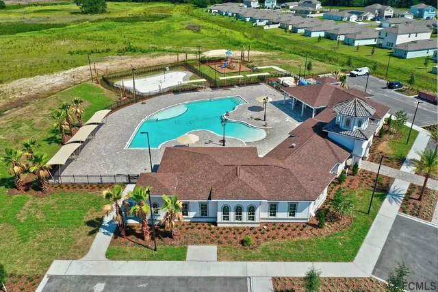 a kitchen with a stove and a microwave