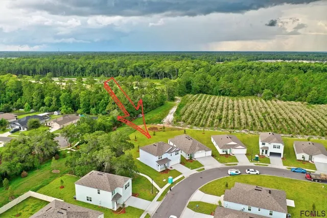 a view of swimming pool and outdoor seating