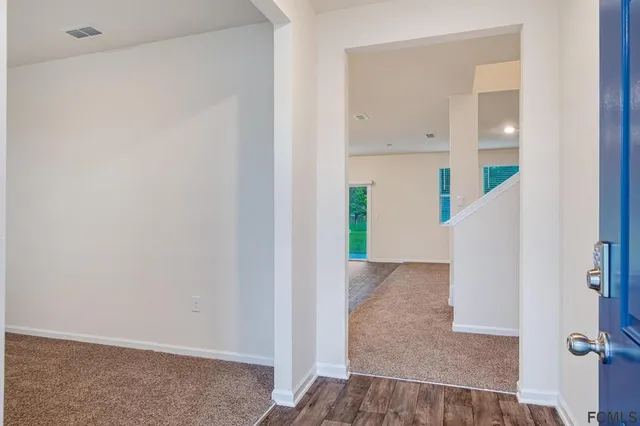 a view of an entryway with staircase