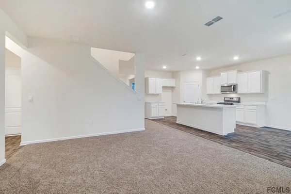 a view of a room that has a window in it