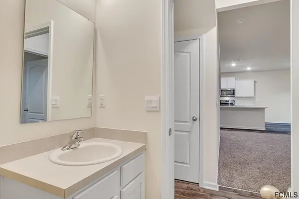 a bathroom with a bathtub and a toilet
