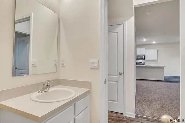 a bathroom with a bathtub and a toilet