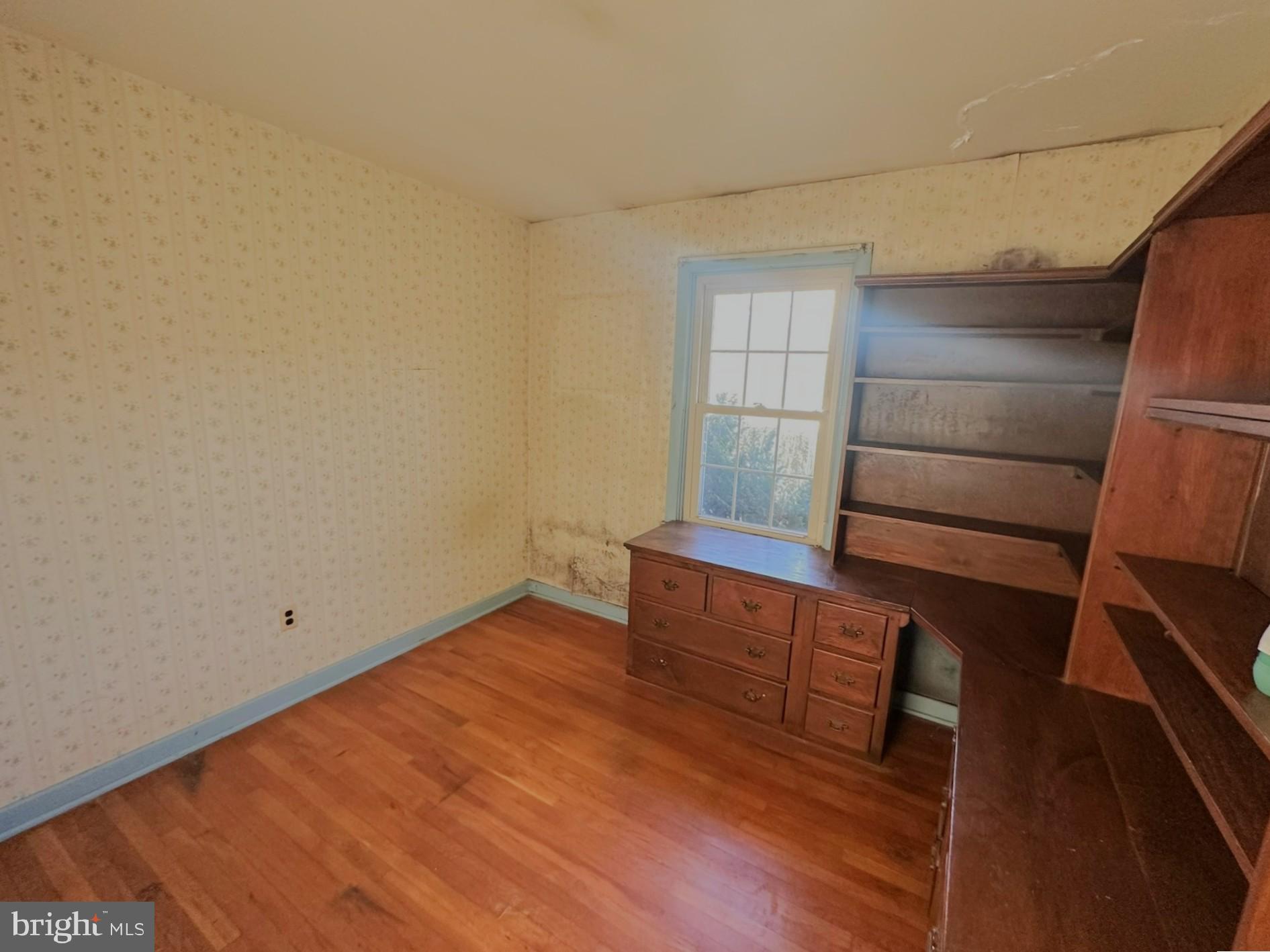 6355 Pigeon Hill Road Spring Grove, PA 17362 - Photo 20 of 55 a view of room with wooden floor and chair