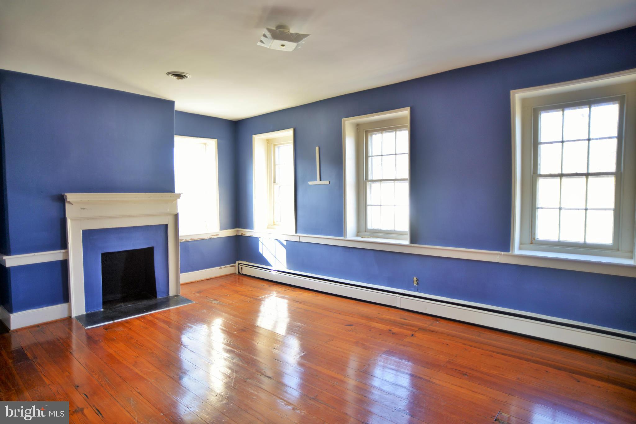 2203 Marker Road Middletown, MD 21769 - Photo 13 of 21 a view of an empty room with window and fire place