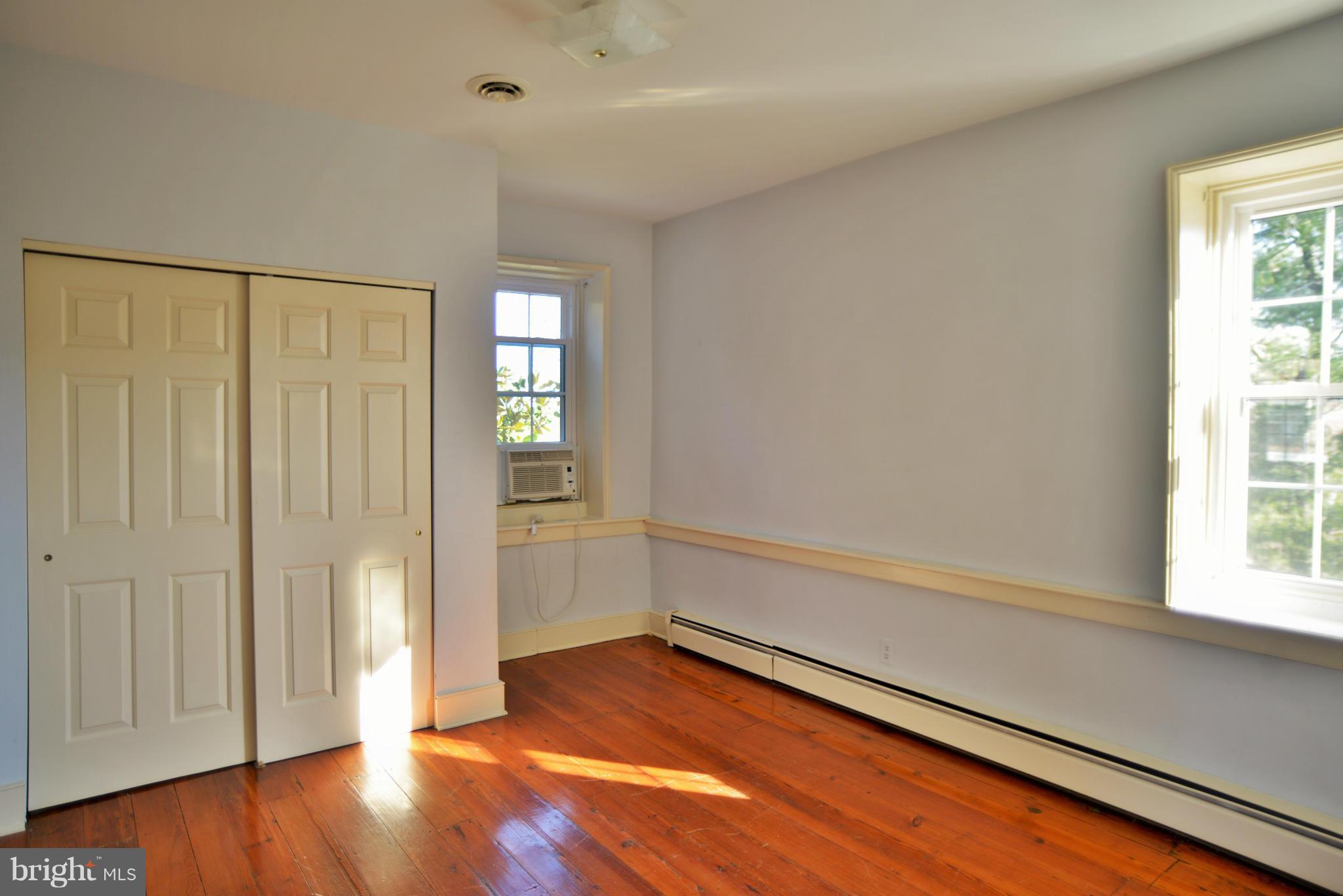 2203 Marker Road Middletown, MD 21769 - Photo 16 of 21 a view of an empty room with wooden floor and a window