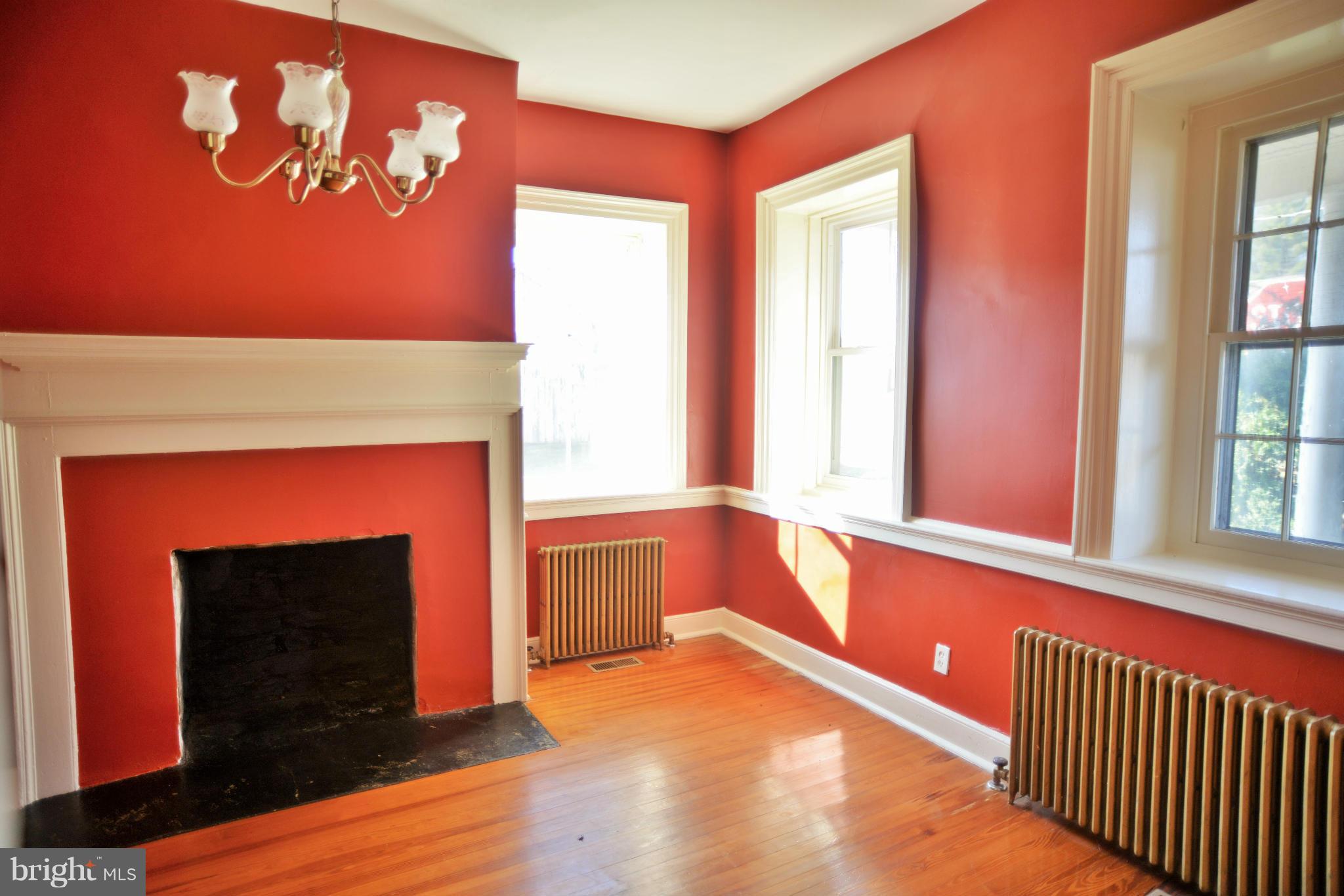 2203 Marker Road Middletown, MD 21769 - Photo 6 of 21 a view of a room with window and fireplace
