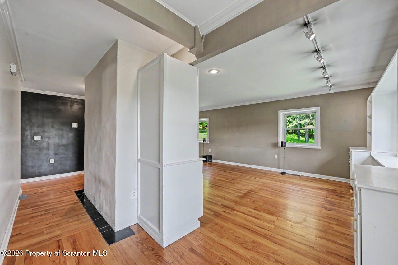 457 Craig Road Dalton, PA 18414 - Photo 15 of 114 a view of a hallway view with wooden floor and staircase