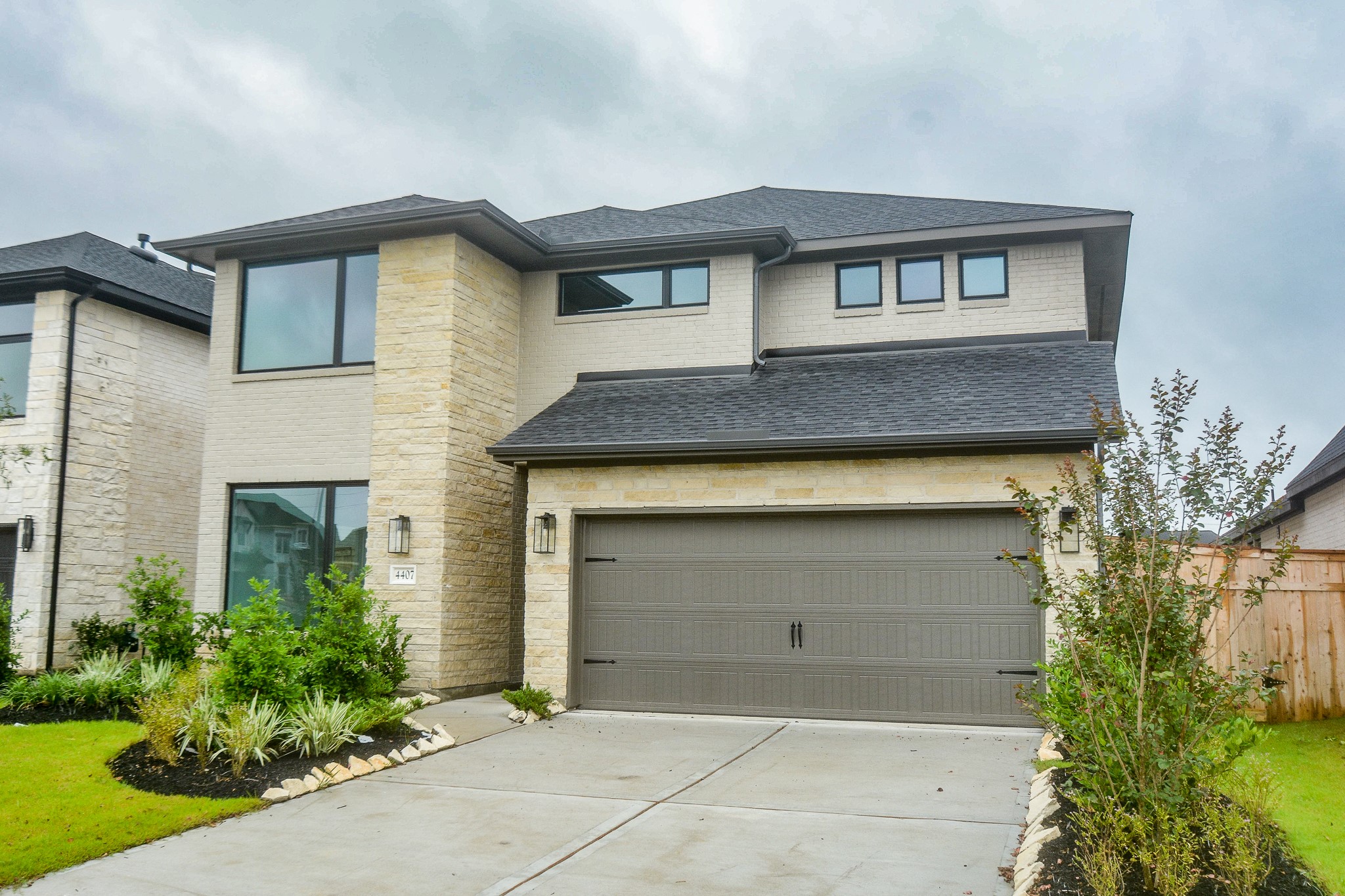 4407 Ruby Gdn Court Fulshear, TX 77441 - Photo 1 of 32 eautiful front elevation with modern curb appeal