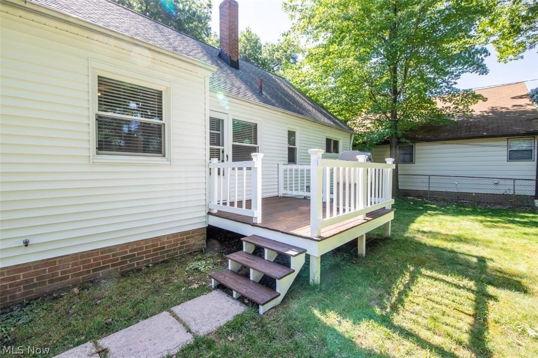 1100 Haverston Road Lyndhurst, OH 44124 - Photo 22 of 24 Deck overlooks Large Backyard with Privacy Fence