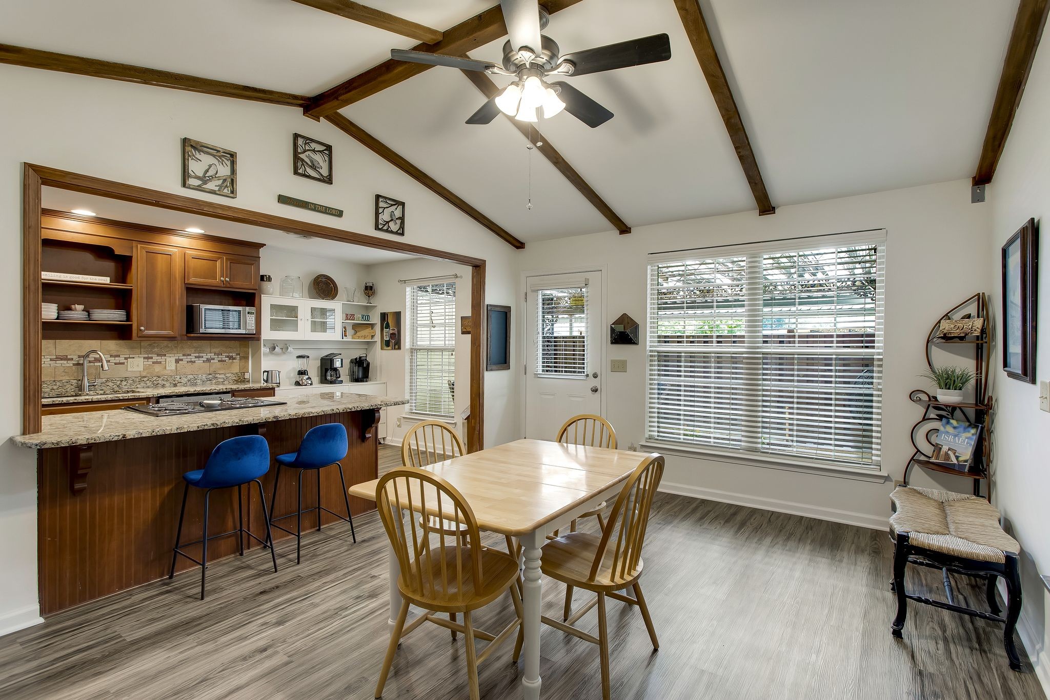 1122 General George Patton Road Nashville, TN 37221 - Photo 15 of 32 a view of a dining room with furniture window and wooden floor