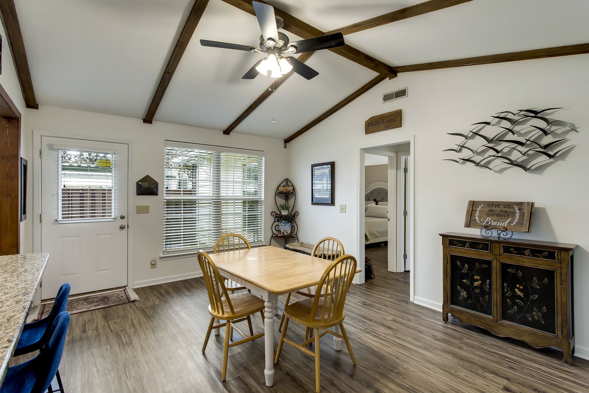 1122 General George Patton Road Nashville, TN 37221 - Photo 16 of 32 a view of a dining room with furniture window and wooden floor