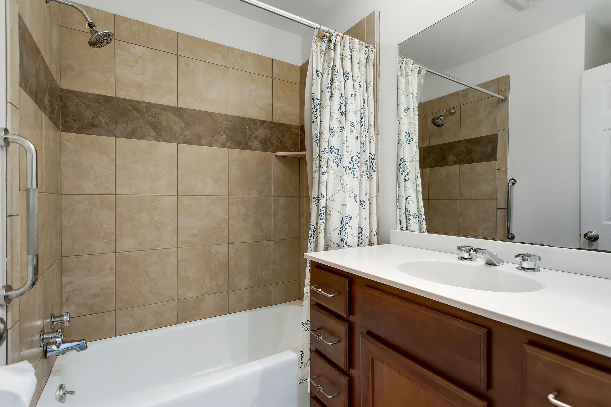 1122 General George Patton Road Nashville, TN 37221 - Photo 26 of 32 a bathroom with a sink and a bathtub
