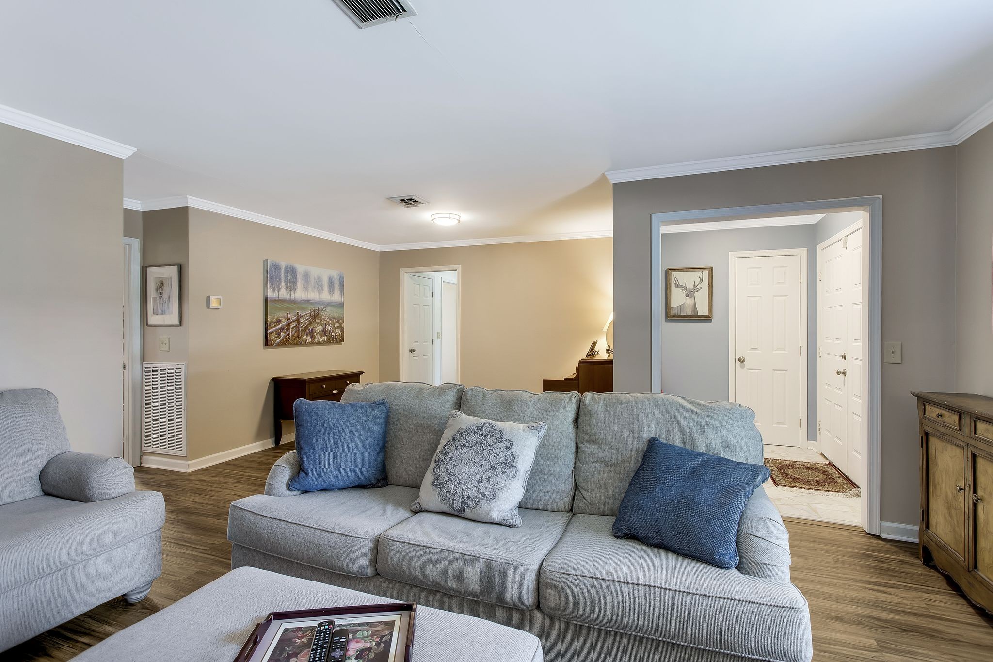1122 General George Patton Road Nashville, TN 37221 - Photo 4 of 32 a living room with furniture and a wooden floor