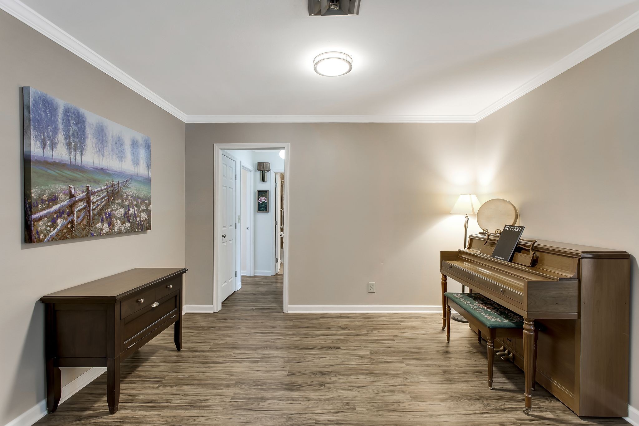 1122 General George Patton Road Nashville, TN 37221 - Photo 7 of 32 a view of a workspace with furniture and wooden floor