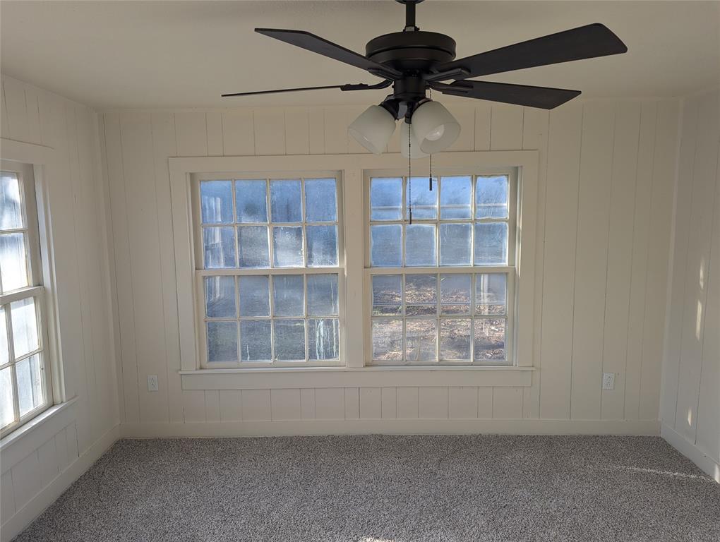 502 East Baker Street Hamilton, TX 76531 - Photo 12 of 37 an empty room with a window