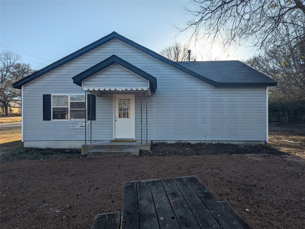 502 East Baker Street Hamilton, TX 76531 - Photo 36 of 37 a front view of a house with yard