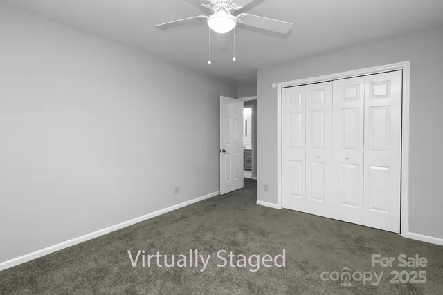 a bathroom with a shower and a toilet