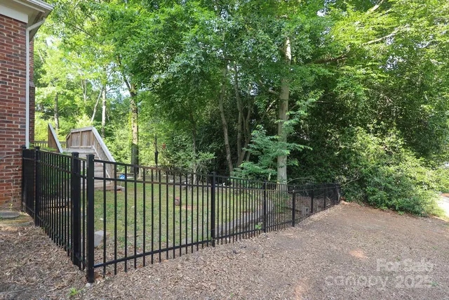 a view of balcony with deck and trees