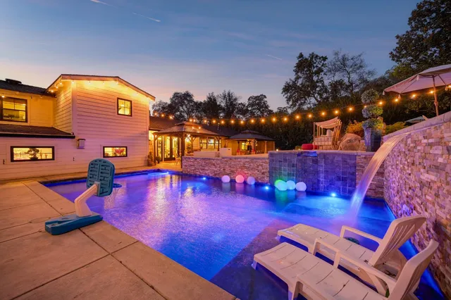 a view of a chairs and tables in the patio