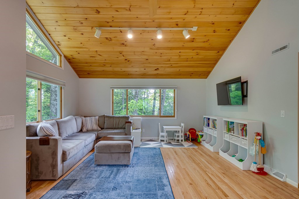 65 Angelica Drive Framingham, MA 01701 - Photo 13 of 34 a living room with furniture and a large window