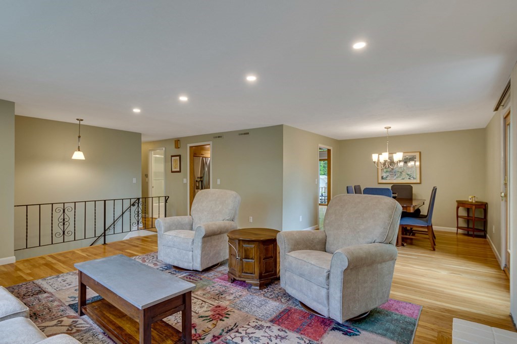 65 Angelica Drive Framingham, MA 01701 - Photo 6 of 34 a living room with furniture and wooden floor