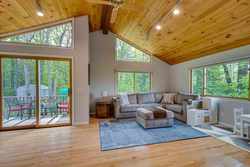 65 Angelica Drive Framingham, MA 01701 - Photo 10 of 34 a living room with furniture and a large window