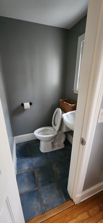 63 Rencelau Street Springfield, MA 01118 - Photo 10 of 28 a bathroom with a toilet and a sink