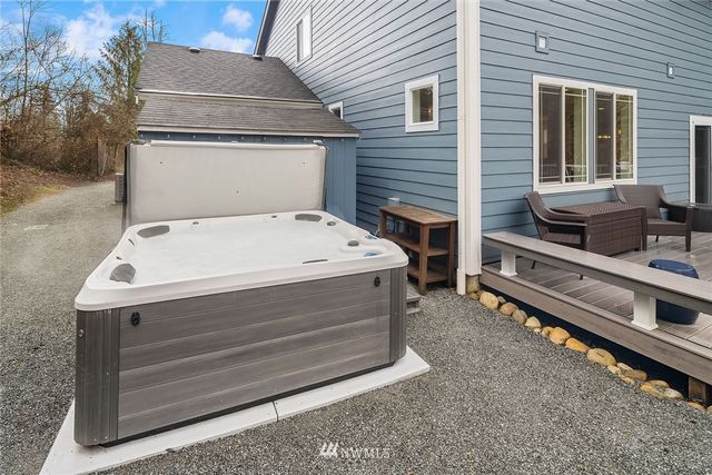 a view of a swimming pool with lounge chair