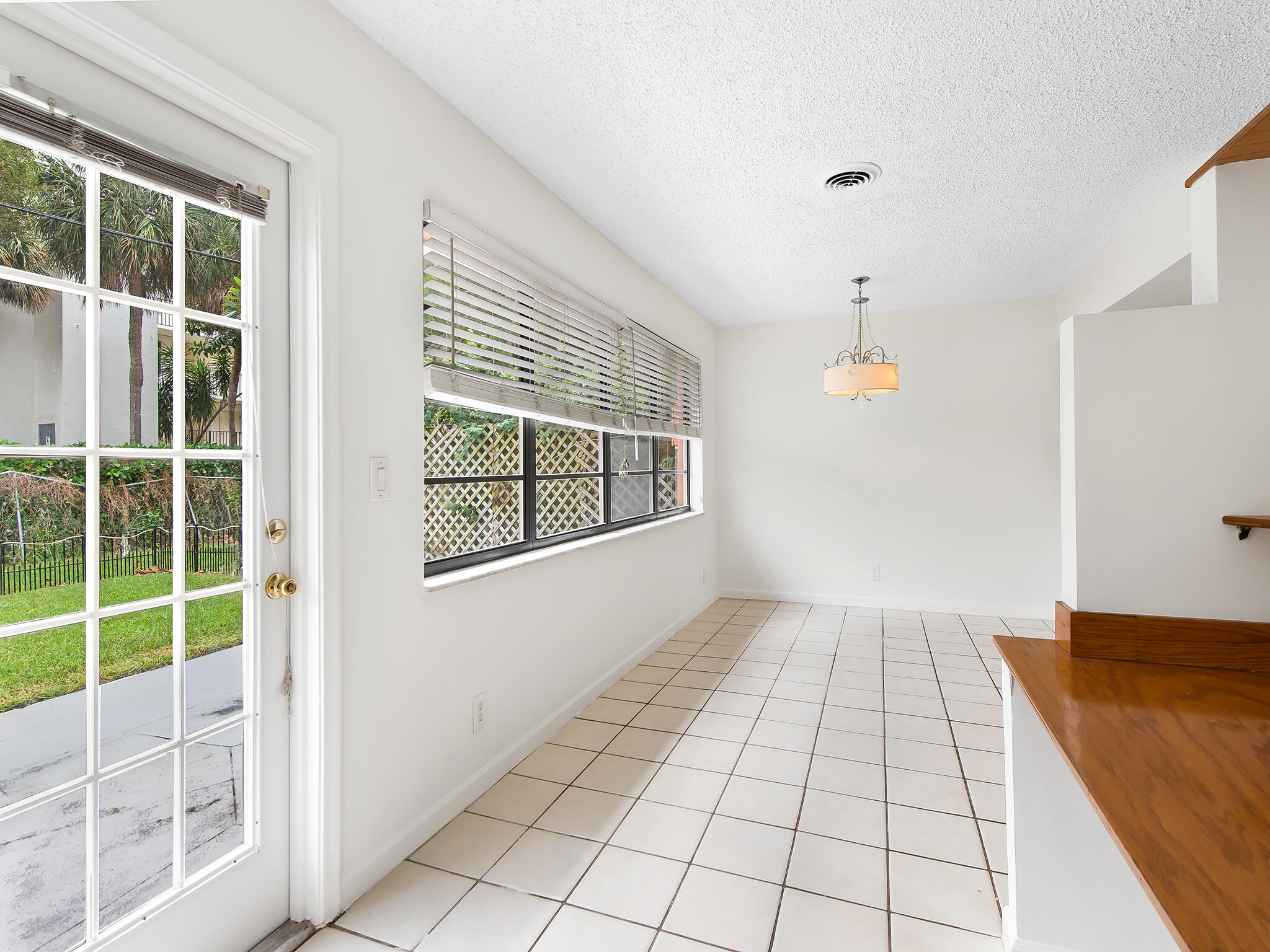280 Northeast Wavecrest Way Boca Raton, FL 33432 - Photo 12 of 29 a view of an empty room and window