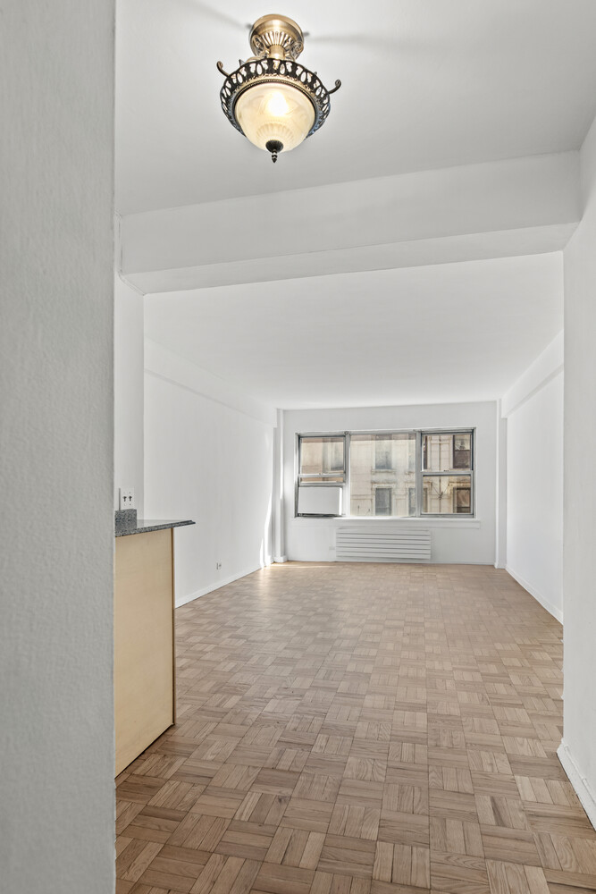 288 Lexington Avenue, Unit 3B Manhattan, NY 10016 - Photo 7 of 10 a view of an empty room with a window