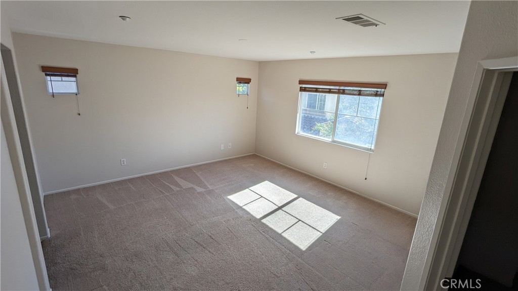 25862 Iris Avenue, Unit B Moreno Valley, CA 92551 - Photo 14 of 23 a view of an empty room and window