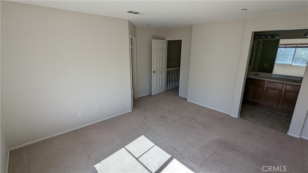 25862 Iris Avenue, Unit B Moreno Valley, CA 92551 - Photo 15 of 23 a view of a kitchen cabinets and a refrigerator